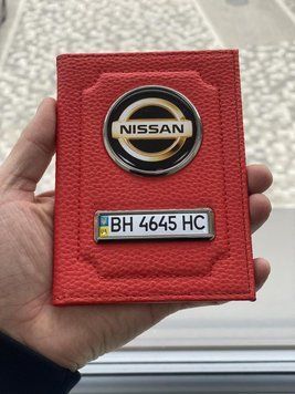 Шкіряна обкладинка для автодокументів із логотипом NISSAN і годен. номером авто ребриста червона шкіра